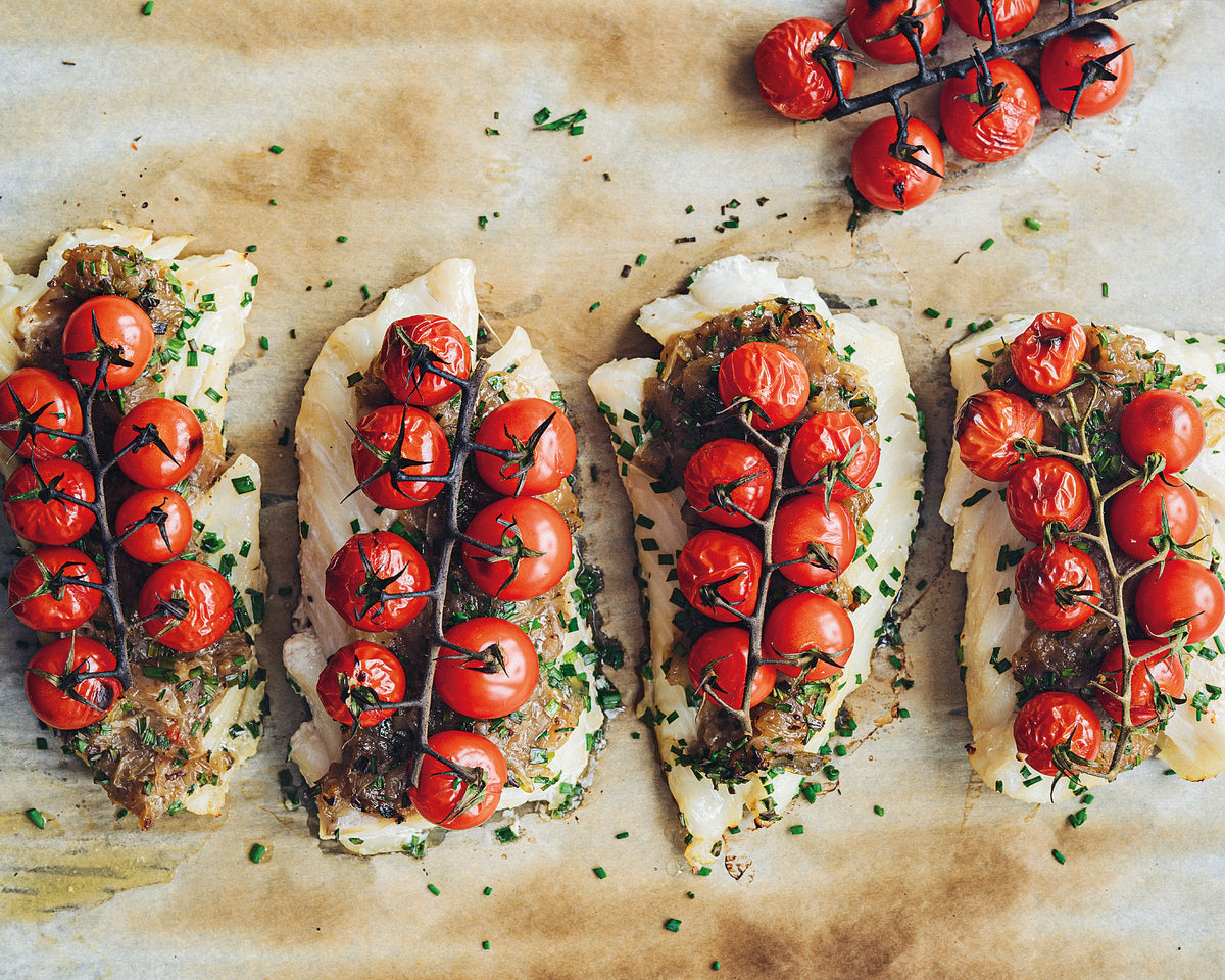 Filet de morue au confit d’oignons et tomates